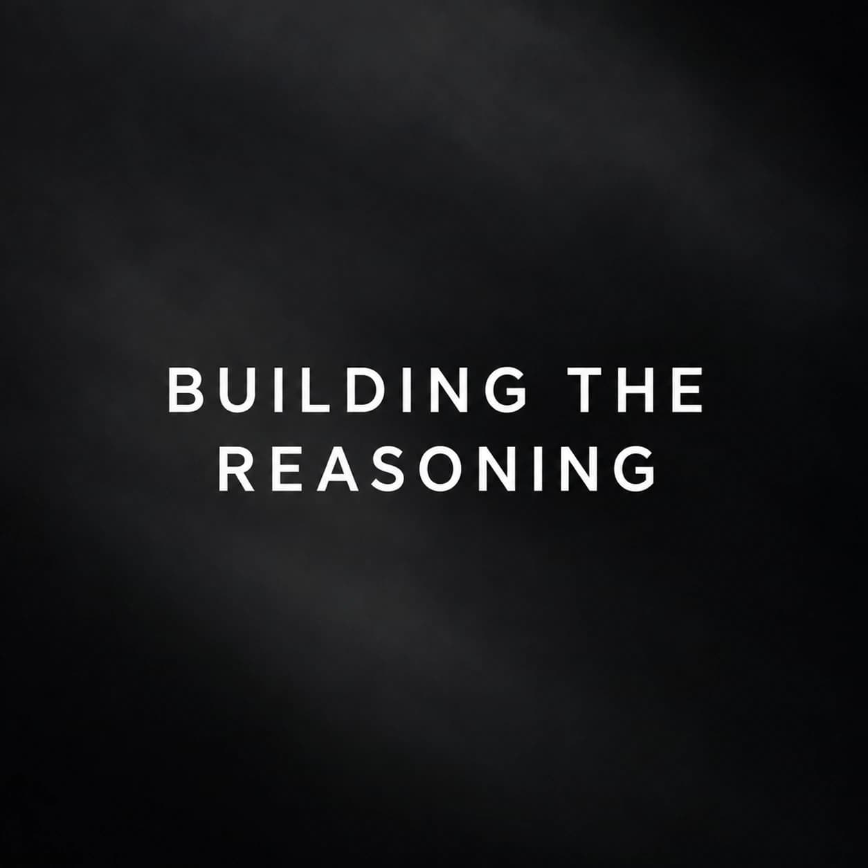 Building the Reasoning set in white type on a dark textured background.